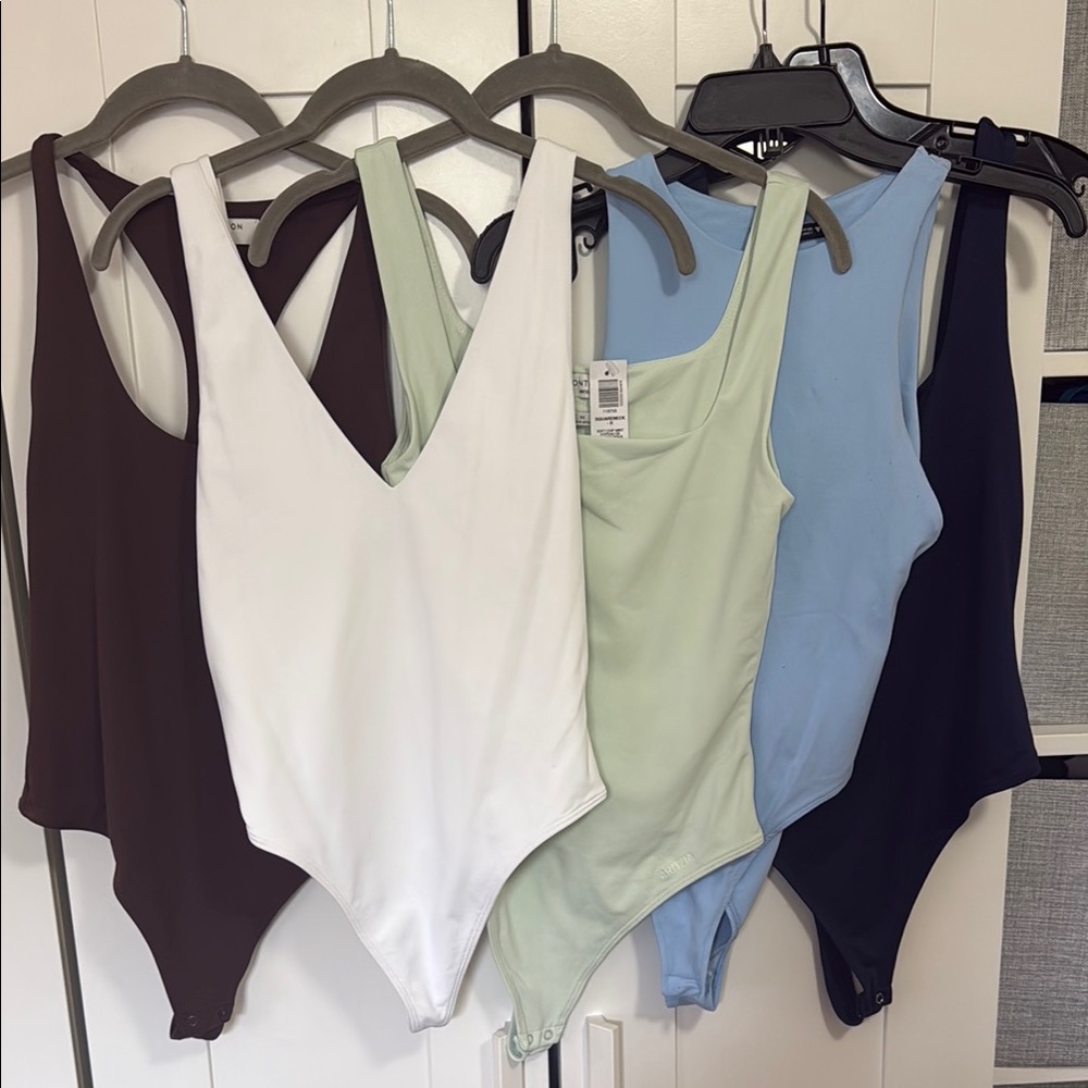 Aritzia Set of Five Bodysuits in Assorted Colors